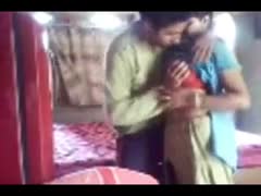 A dark-haired, unskilled, Desi lady in a saree gives her husband bj.